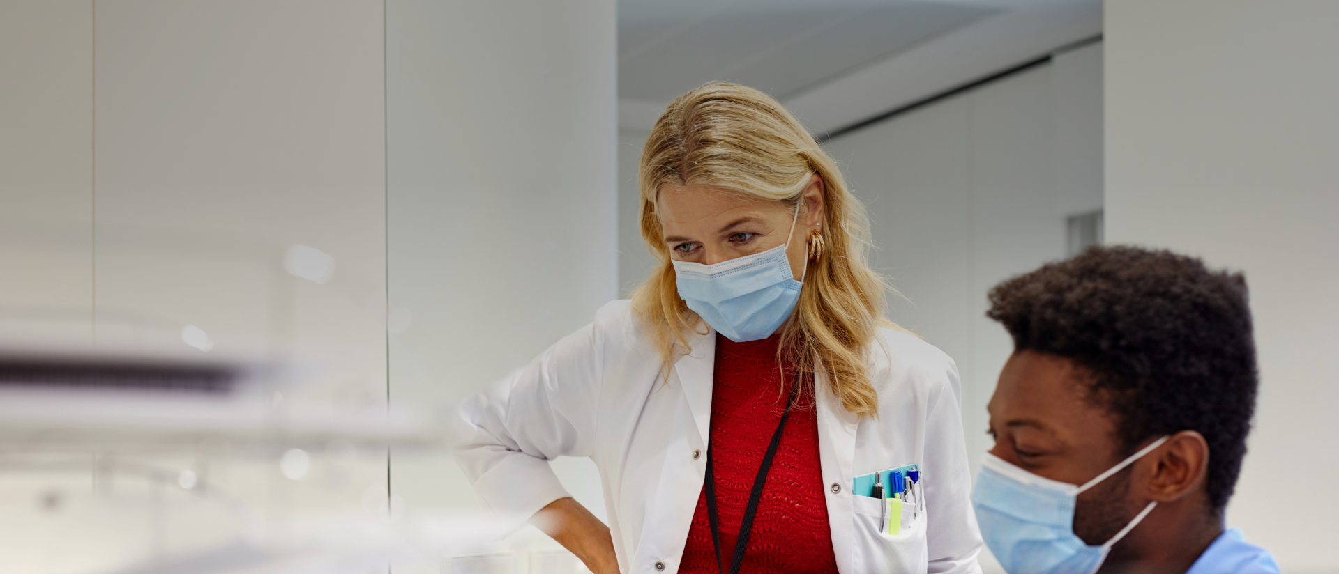 a doctor looking at a patient